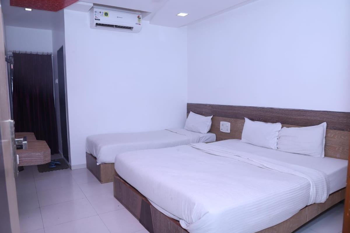 Hotel Kewal Inn Jalgaon ภายนอก รูปภาพ