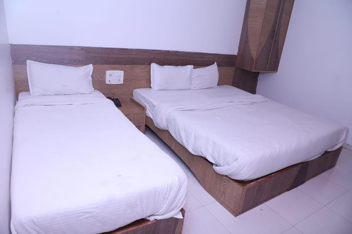 Hotel Kewal Inn Jalgaon ภายนอก รูปภาพ