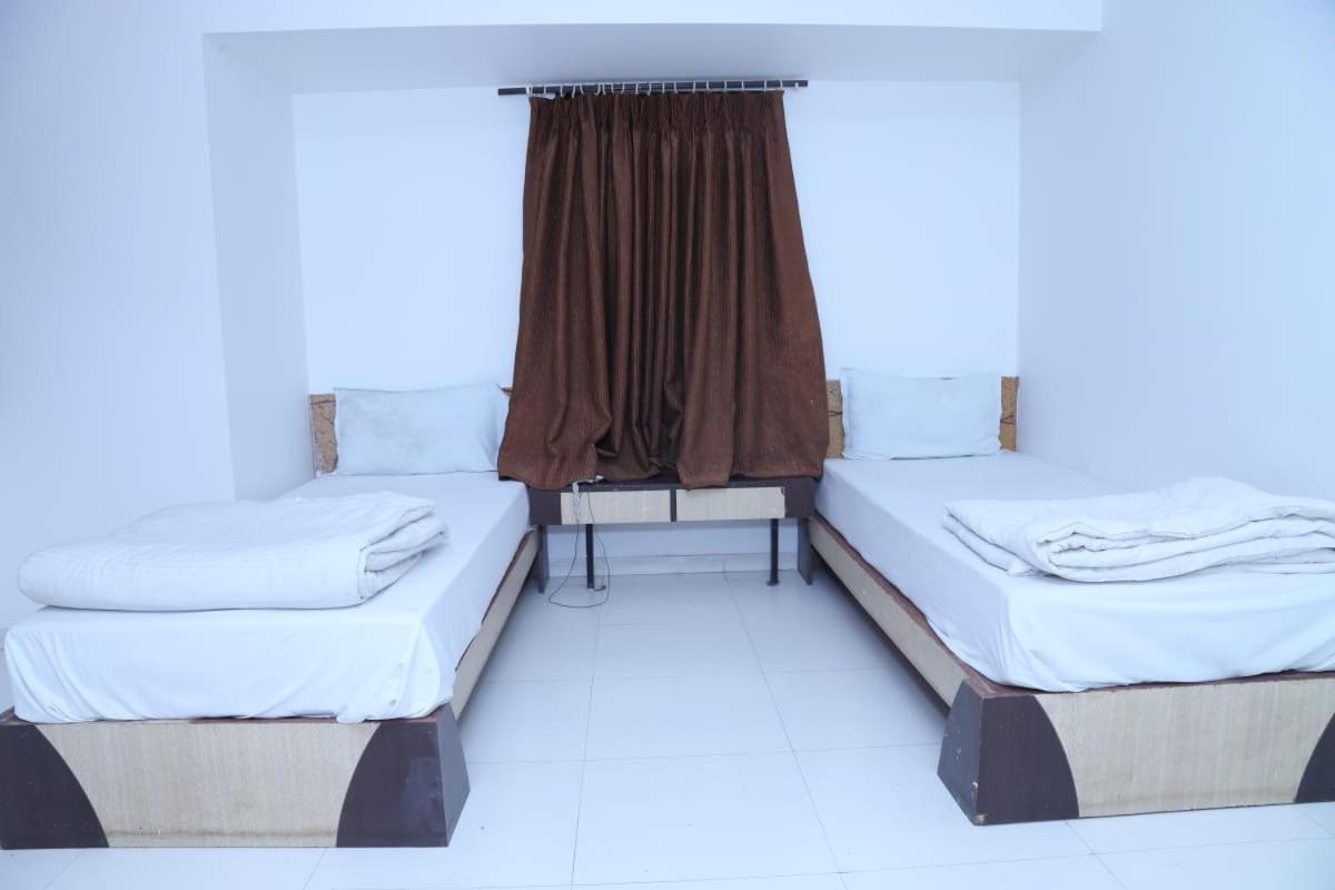 Hotel Kewal Inn Jalgaon ภายนอก รูปภาพ